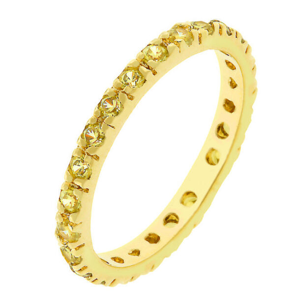 Yellow 3-stone ring with round cubic zirconia in a channel setting and gold tone finish over lead free alloy (brass).