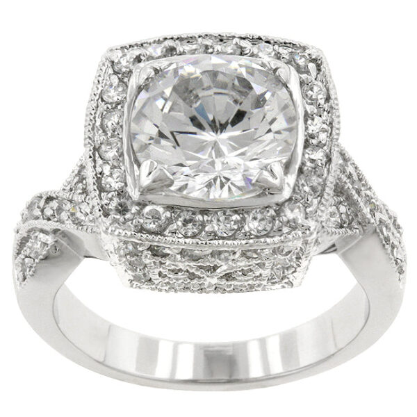 Pink round cubic zirconia ring with a bezel setting, rhodium plated over lead free alloy (brass).