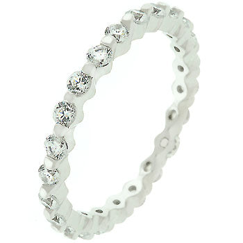Lace eternity band in rhodium plated over .925 sterling silver with clear, round cubic zirconia in a bar setting.