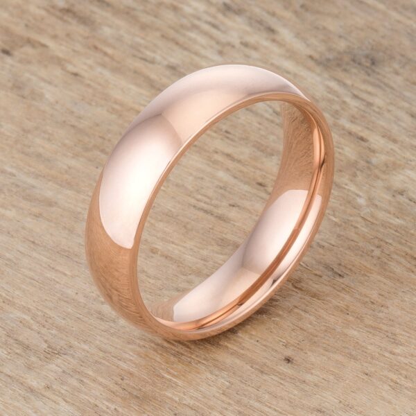 Wedding style band measuring 5 (mm) wide in rose gold tone finish over 304l stainless steel.