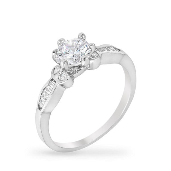 Rhodium plated over lead free alloy (brass) ring with round cubic zirconia in a channel setting.