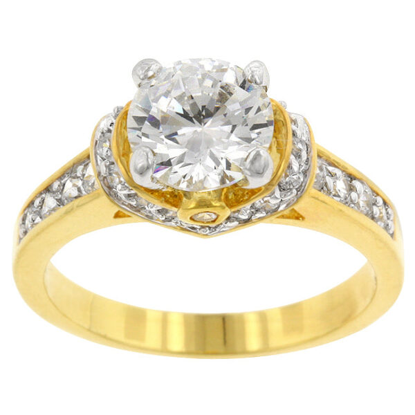 Engagement-style ring with round cubic zirconia in a bezel setting and gold tone over lead free alloy (brass).