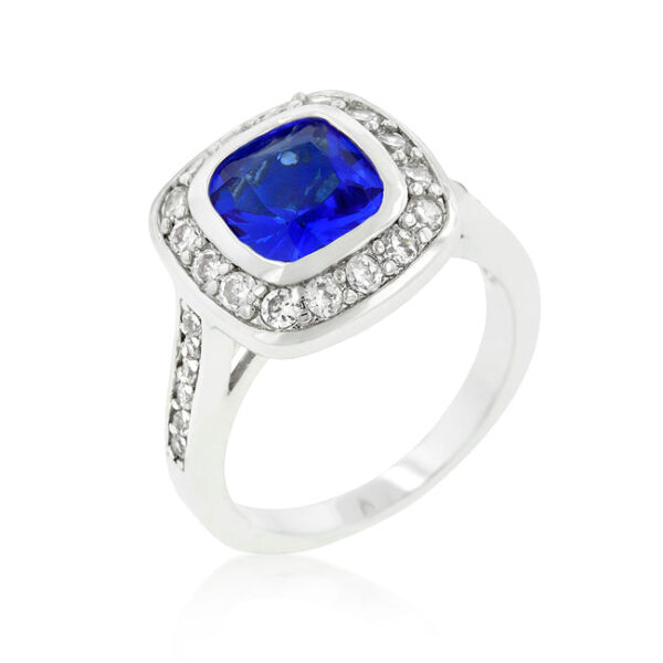 Classic sapphire-colored cubic zirconia ring in rhodium plated over lead free alloy (brass), with Cushion and Round cuts and a Bezel setting.