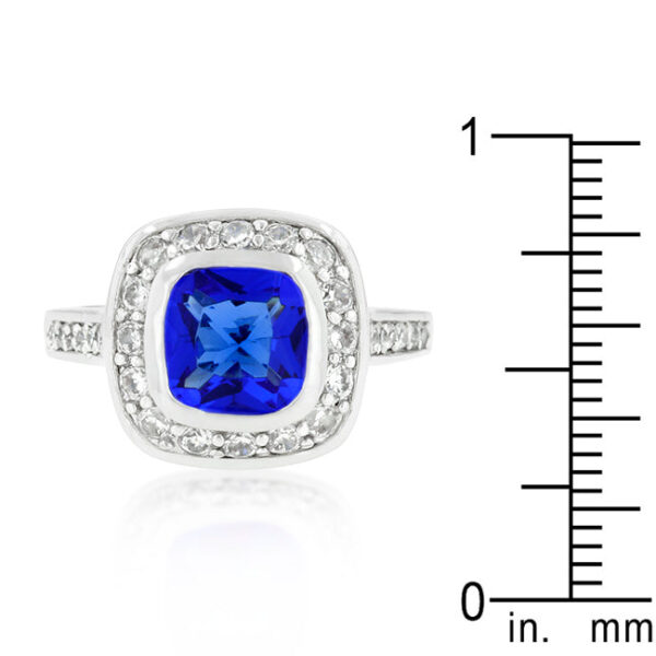 Sapphire-colored cubic zirconia ring with a Bezel setting and rhodium plated over lead free alloy (brass).