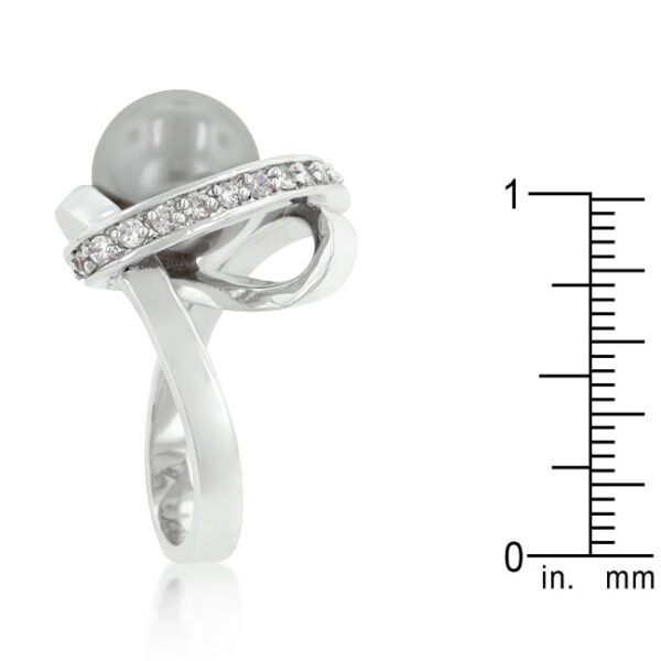 Round simulated pearls in prong settings on a rhodium plated over lead free alloy (brass) knotted ring.