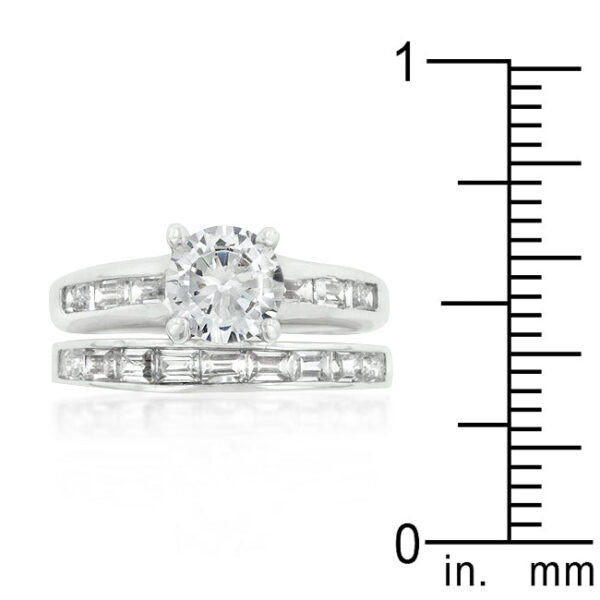 Baguette and round genuine cubic zirconia ring set in prongs, rhodium plated over lead free alloy (brass).