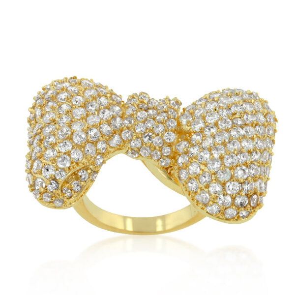 Bow tie ring with round cubic zirconia in a pave setting, 9.7 ct total stone weight, and gold tone finish over lead free alloy (brass).