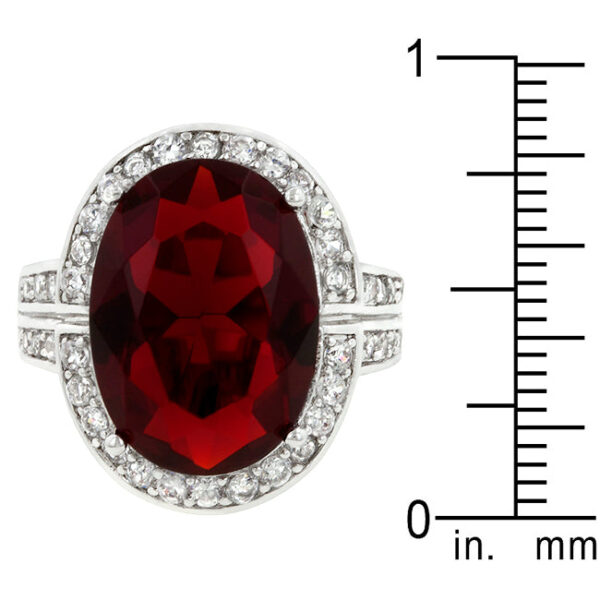 Cocktail ring with genuine ruby-colored oval cubic zirconia, 16.8 ct total stone weight, and rhodium plated over lead free alloy (brass).
