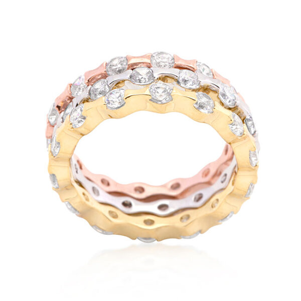 Stackable rings with 6.6 ct total stone weight of round cubic zirconia in invisible settings and gold tone over lead free alloy (brass).