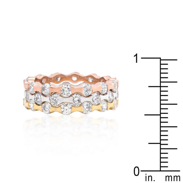 Tri-tone rings combining rose gold and gold tone over lead free alloy (brass), set with round cubic zirconia.