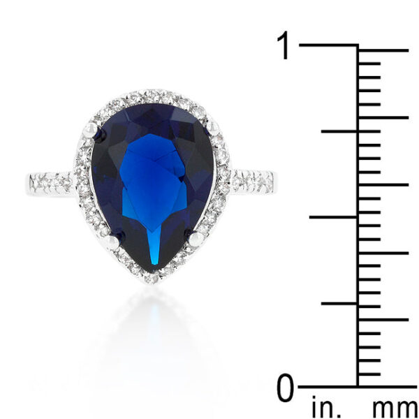 Sapphire-colored cubic zirconia drop ring with 7.5 ct total stone weight and rhodium plated over lead free alloy (brass).