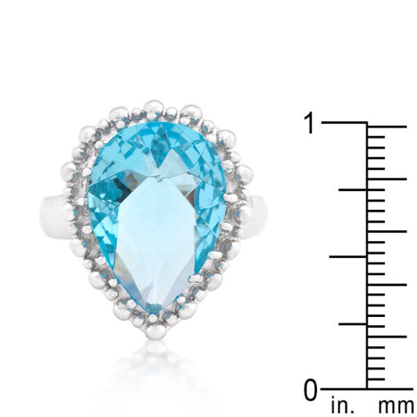 Topaz-colored cubic zirconia in prongs on a rhodium plated over lead free alloy (brass) ring.