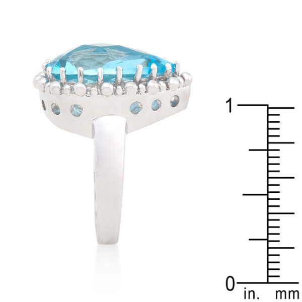 Rhodium plated over lead free alloy (brass) ring with pear-cut topaz-colored cubic zirconia.