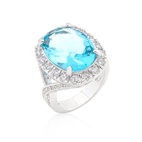 Blue oval topaz-colored cubic zirconia cocktail ring in prongs, rhodium plated over lead free alloy (brass).