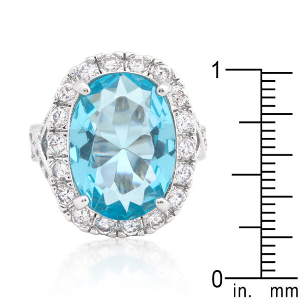 Prong-set blue topaz-colored cubic zirconia ring, rhodium plated over lead free alloy (brass).