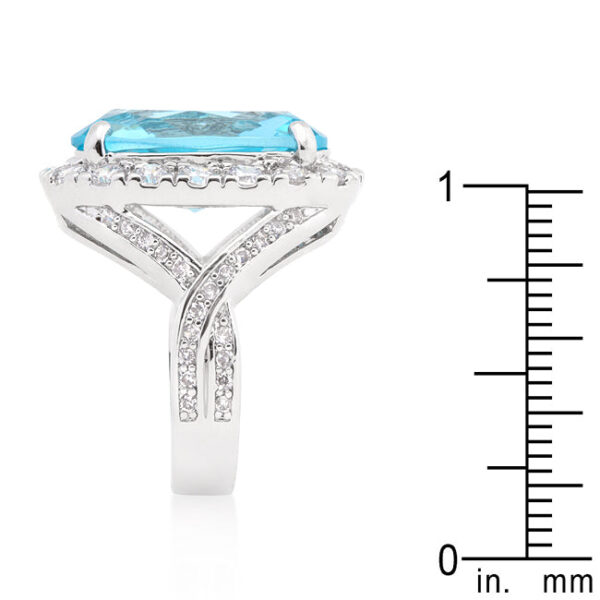 Blue oval-cut topaz-colored cubic zirconia cocktail ring in prongs, rhodium plated over lead free alloy (brass).