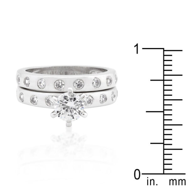 Bridal wedding ring set with round cubic zirconia, bezel settings, and 3.3 ct total stone weight.