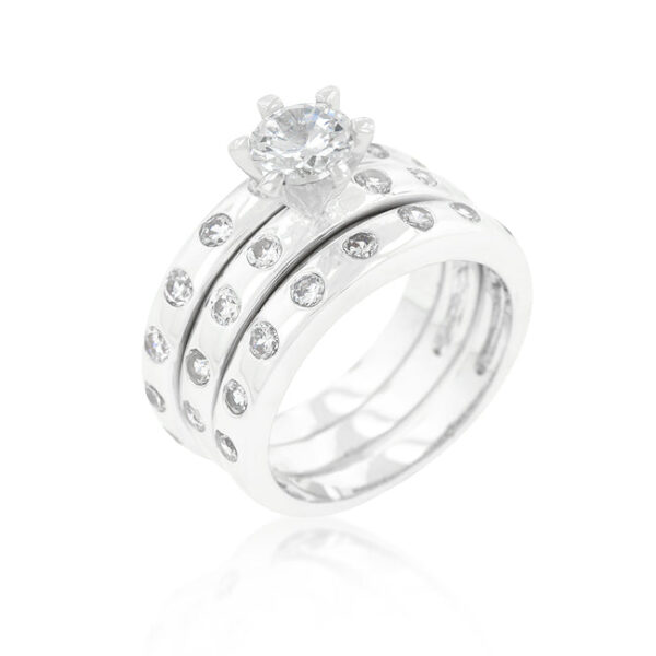 Bezel set engagement ring set with round cubic zirconia, rhodium plated over lead free alloy (brass).