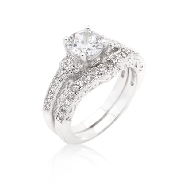 The set ring set with cubic zirconia in pave, rhodium plated over lead free alloy (brass).