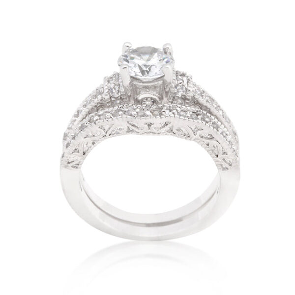 Round cubic zirconia pave bridal ring set with 4.9 ct total stone weight and rhodium plated over lead free alloy (brass).
