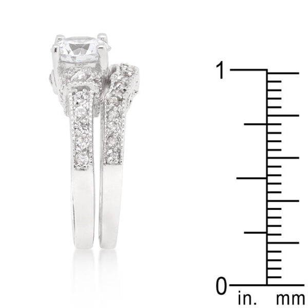 Classic wedding set with round cubic zirconia, pave setting, and rhodium plated over lead free alloy (brass).