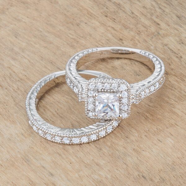 Princess-cut cubic zirconia bridal set with rhodium plated over lead free alloy (brass) construction.
