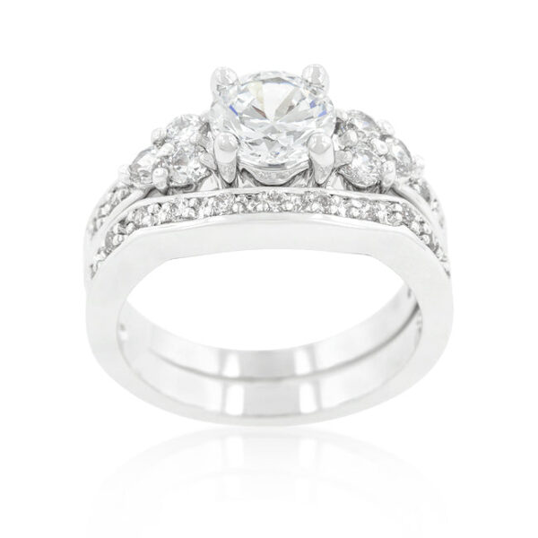 Clear round cubic zirconia triple stone ring set in pave with 4 ct total carat weight.