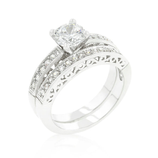 Filigree engagement set with round cubic zirconia in prongs, rhodium plated over lead free alloy (brass).