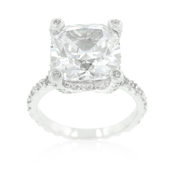 Cushion cubic zirconia in prongs on a 2 Mm rhodium plated over lead free alloy (brass) ring with 7.2 ct total stone weight