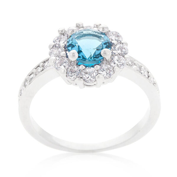 Round blue cubic zirconia ring with prongs and rhodium plated over lead free alloy (brass).
