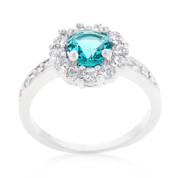 Blue round cubic zirconia ring with prong settings, 6 Mm stone size, and rhodium plated over lead free alloy (brass).