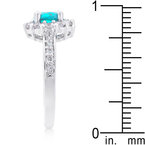 Round blue cubic zirconia in prongs on a 2 Mm ring in rhodium plated over lead free alloy (brass).