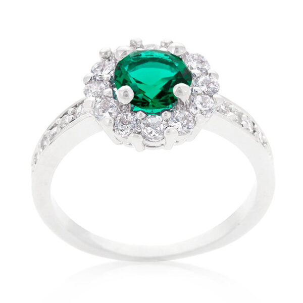 Rhodium plated over lead free alloy (brass) ring with green round cubic zirconia and prong setting.