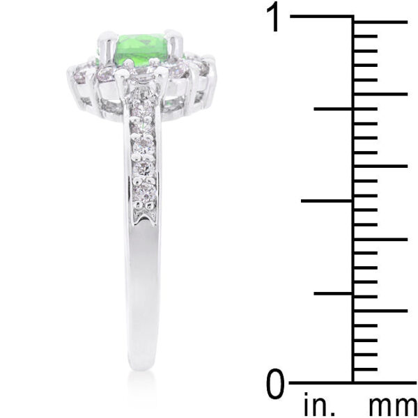 Rhodium plated over lead free alloy (brass) ring with green round cubic zirconia in prongs.