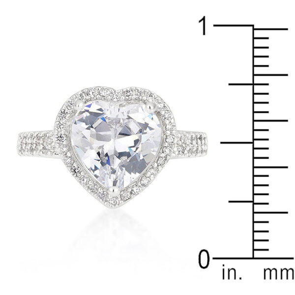 Heart design ring with genuine pink cubic zirconia in prongs and rhodium plated over lead free alloy (brass).