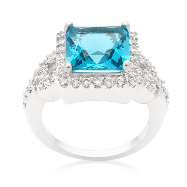 Aqua blue halo-style cocktail ring with princess-cut cubic zirconia in prongs
