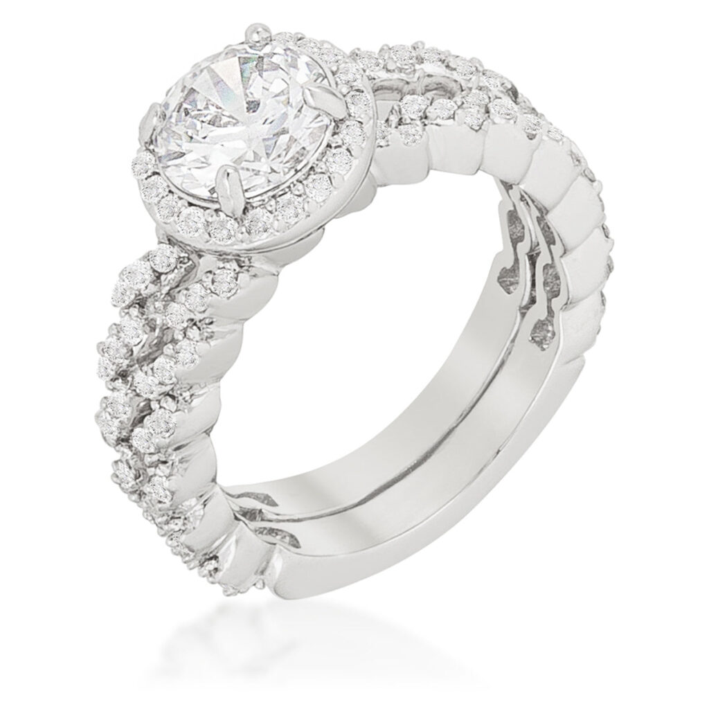 The set with neon pink round cubic zirconia in prongs, rhodium plated over lead free alloy (brass).