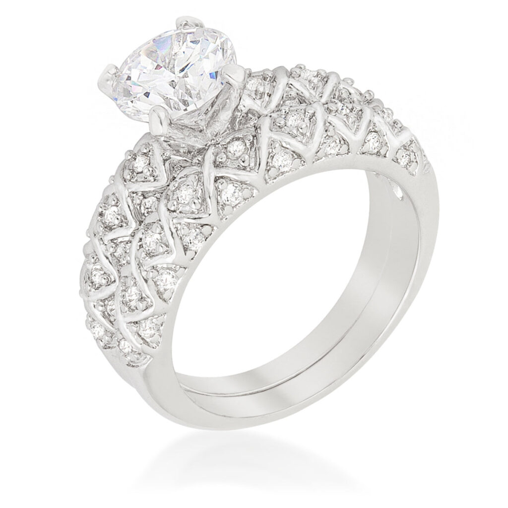 Pink round cubic zirconia wedding set in prongs, rhodium plated over lead free alloy (brass).