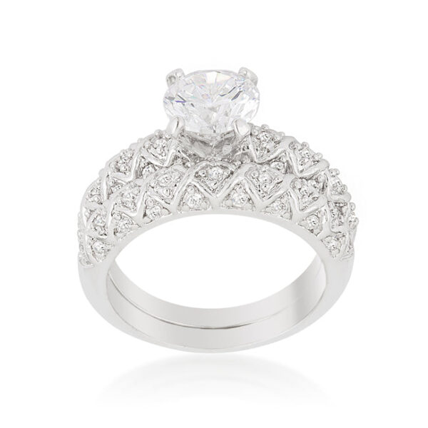 Floral wedding set with pink round cubic zirconia in prongs and a rhodium plated over lead free alloy (brass) finish.