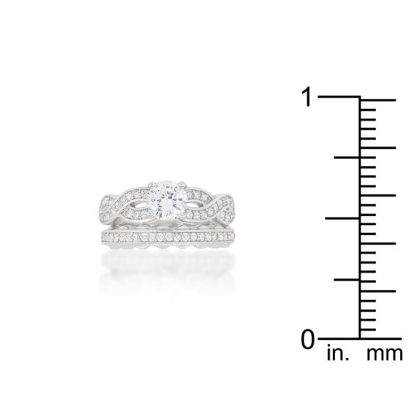 Round cubic zirconia bridal set in prongs with 6.2 Mm stone size and 1.54 ct total stone weight, rhodium plated over lead free alloy (brass).
