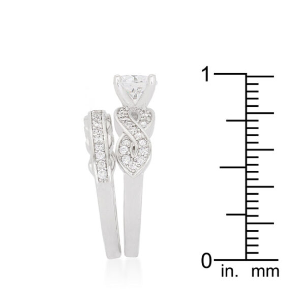 Infinity twist bridal ring set with round cubic zirconia in prongs, rhodium plated over lead free alloy (brass), 4 Mm wide.