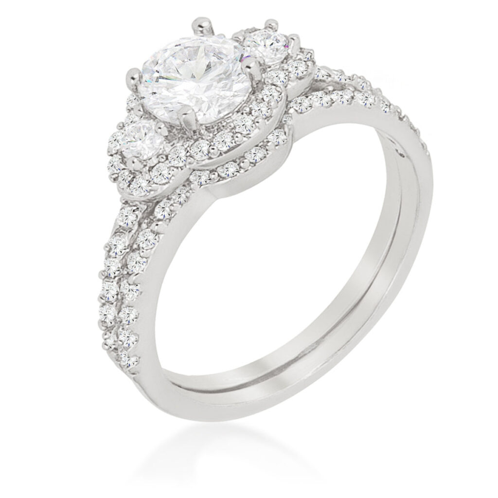 Rhodium plated over lead free alloy (brass) wedding set with round cubic zirconia in prongs.