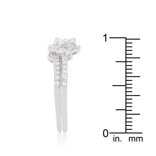 Prong-set round cubic zirconia wedding set in rhodium plated over lead free alloy (brass).