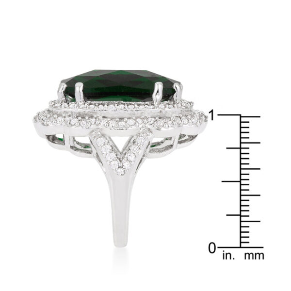 Crest-design ring with green faceted cubic zirconia and a rhodium plated over lead free alloy (brass) finish.