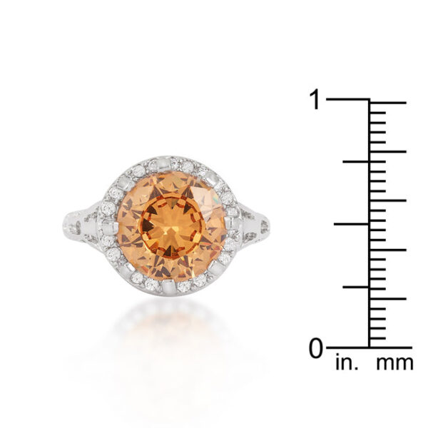 Round champagne cubic zirconia cocktail ring in prongs with 4.7 ct total stone weight and a rhodium plated over lead free alloy (brass) finish.