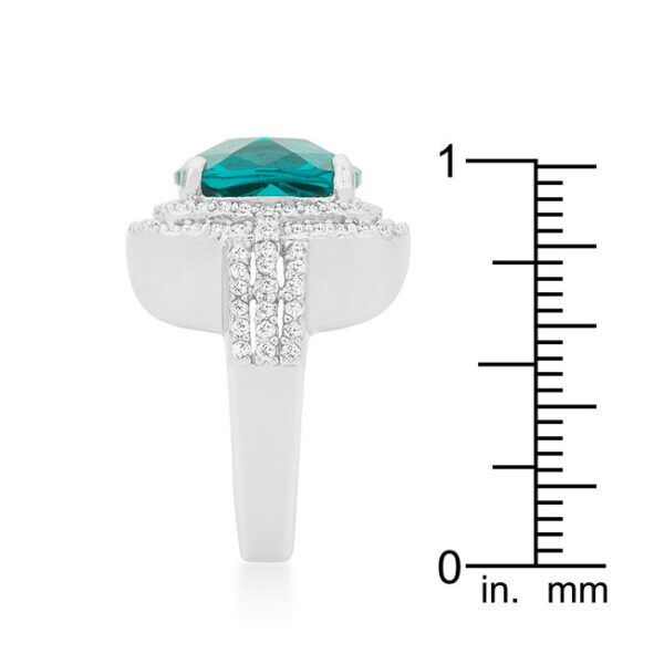 Cocktail ring rhodium plated over lead free alloy (brass) with aqua cubic zirconia in prong settings.