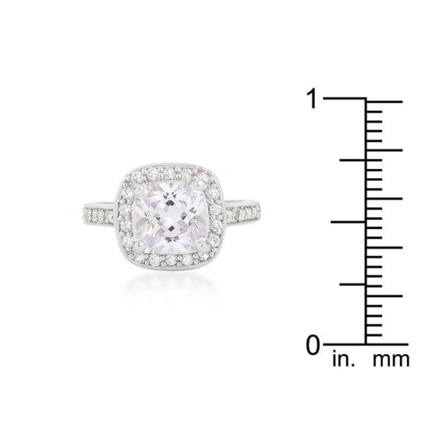 Engagement-style halo ring in rhodium plated over lead free alloy (brass), with cushion-cut cubic zirconia.