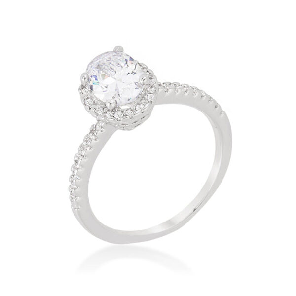 Oval-cut floating halo ring with 3 purple cubic zirconia stones in prong settings, rhodium plated over lead free alloy (brass).