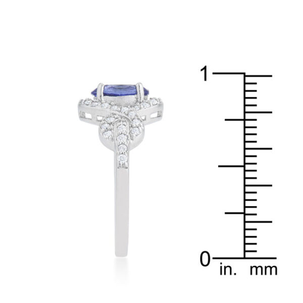 Halo pave ring with 2.9 ct total stone weight, tanzanite-colored cubic zirconia, and rhodium plated over lead free alloy (brass).