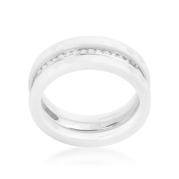 White ceramic triplet ring with round cubic zirconia in prong settings, rhodium plated over .925 sterling silver.